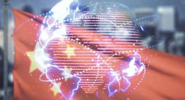 Globe hologram over Chinese flag