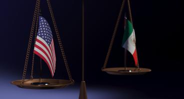 Scale holding Mexican and American flags