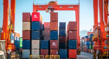 Shipping containers stacked on a cargo ship.
