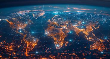 A world map with global network connections on the background of city lights at night.