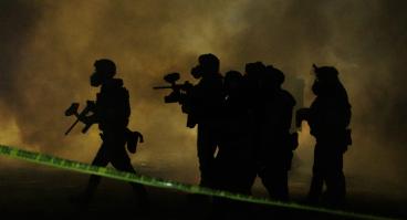 riot police amid smoke