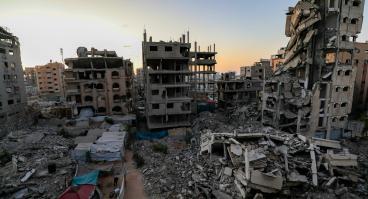 Damaged buildings and rubble in Gaza.