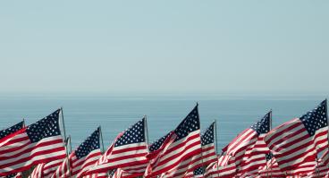 American flags on the sea background.