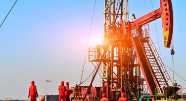 Field oil workers at work.