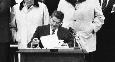 President Ronald Reagan signing bill