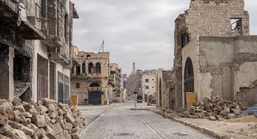 City of Aleppo and destroyed building in Syria.