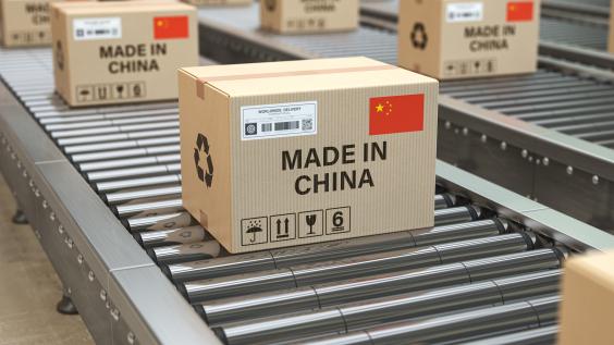 Boxes labeled "MADE IN CHINA" move along a production line.