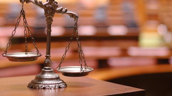 Unbalanced scales of justice.