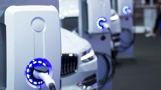 An electric car charges.