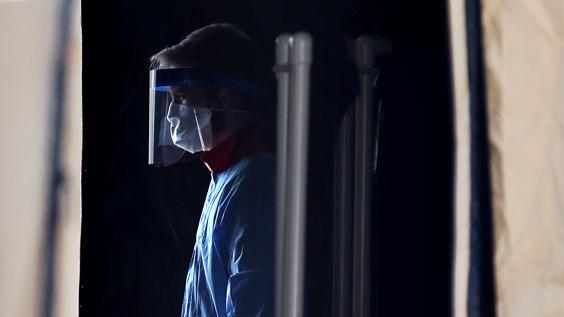 A man wears PPE during the COVID-19 pandemic.