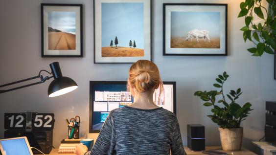 A woman works from her home.