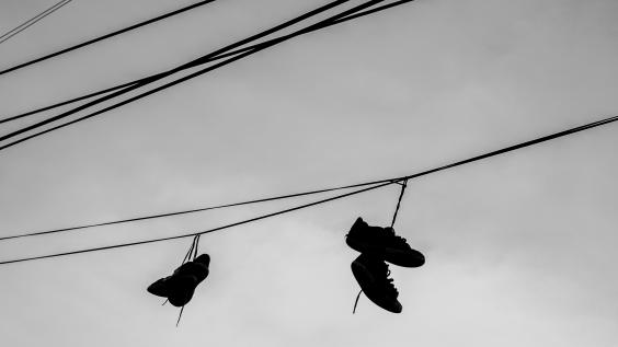 Shoes hang from a power line.