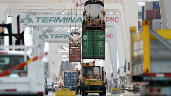 Trucks transport cargo across the U.S.-Mexico border