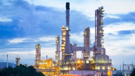 Oil refinery at sunset.