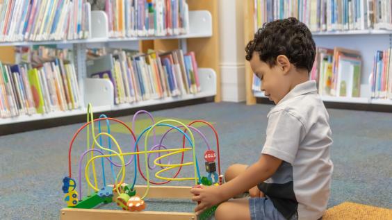 Child playing with toy