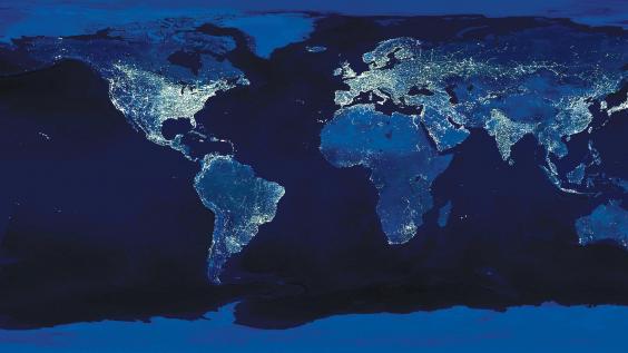 The globe at night, lights in populated areas illuminated