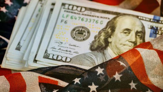 American flag envelopes stack of $100 bills