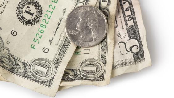 A coin and dollar bills.
