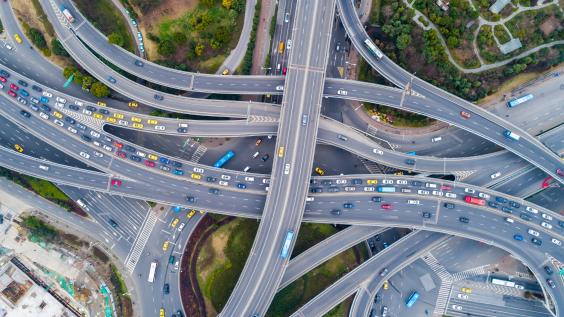 Cars drive on highways.