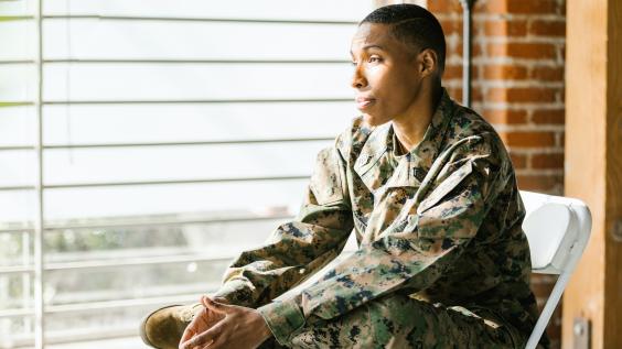 Solider sitting in folding chair