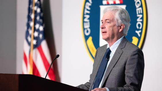CIA Director William Burns speaks at a podium