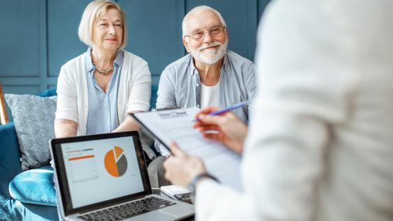 An elderly couple discusses their finances.