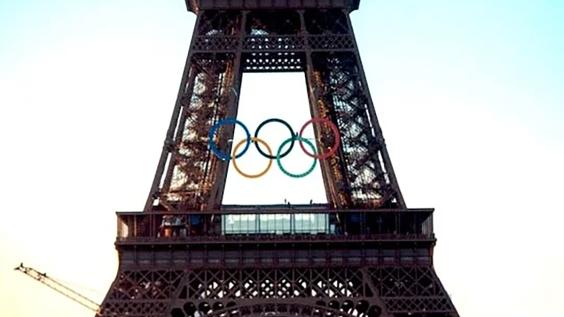 Olympic logo over Eiffel Tower in Paris