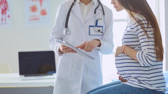 pregnant woman with the doctor at hospital
