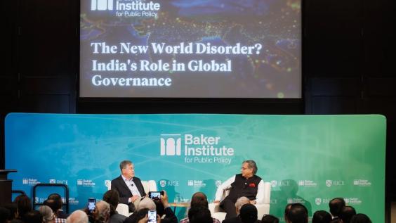 Sashi Tharoor seated on stage with David Satterfield at Baker Hall