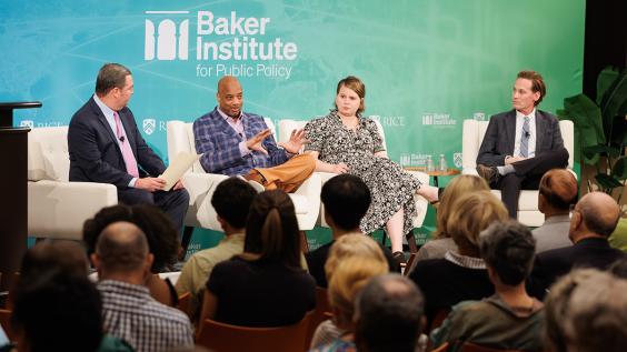 Political journalists Gromer Jeffers, Eleanor Dearman, and Jeff Wermund sitting onstage at Baker Hall with fellow Mark Jones 