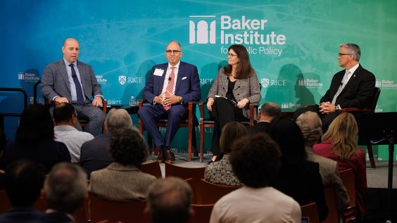 Jason Bennett, Julie Mayo, Anatol Feygin, and Ken Medlock sitting onstage at Baker Hall
