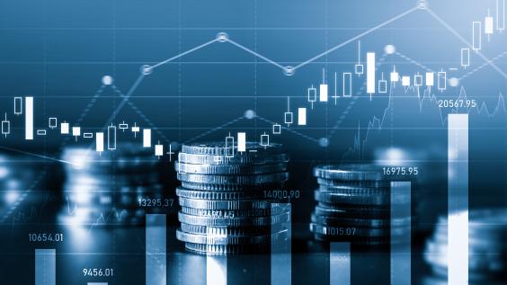 stacks of coins with graphs floating behind