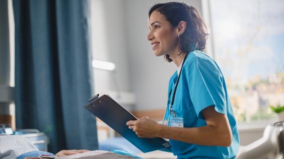 Head nurse fills medical history form