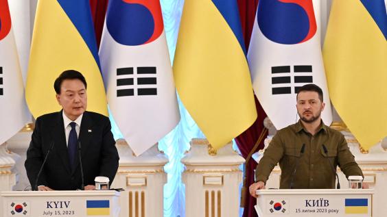 Ukrainian President Volodymyr Zelensky (R) and his South Korean counterpart Yoon Suk Yeol make statements following their talks in Kyiv on July 15, 2023.
