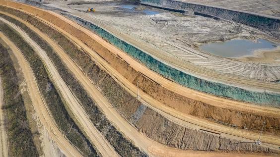  Aerial view of industrial terraces on mineral open pit mine.