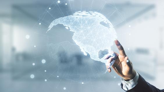 Double exposure of businessman hand working with graphic America map on blurred office background.