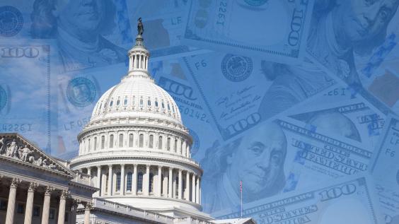 US Capitol building with dollar bills in background