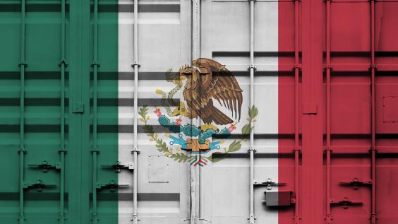 Shipping container with Mexican national flag overlay.