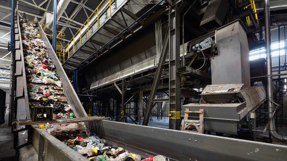 Plastics on conveyor belt for recycling