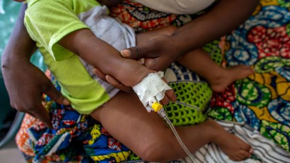 Child receiving treatment at health center at NGO in Dapaong, Togo.