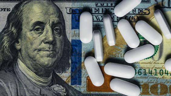Money backdrop with pills. 