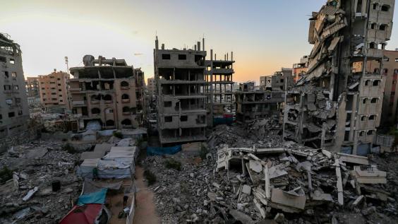 Damaged buildings and rubble in Gaza.