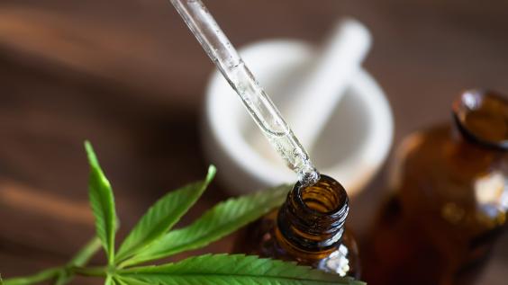 Macro close up of droplet dosing a biological and ecological hemp