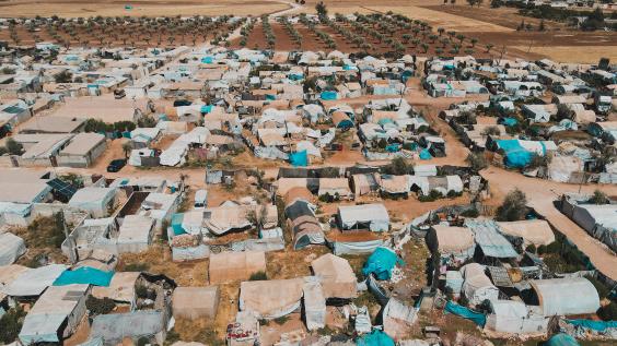 Aerial view of hundreds of tents inhabited by Syrian refugees for years due to the war that destroyed their homes.