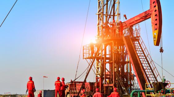 Field oil workers at work.