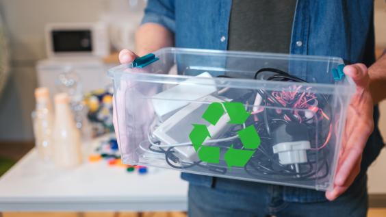 An electronic waste in recycling container close-up.