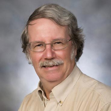 Headshot of Richard Stoll.