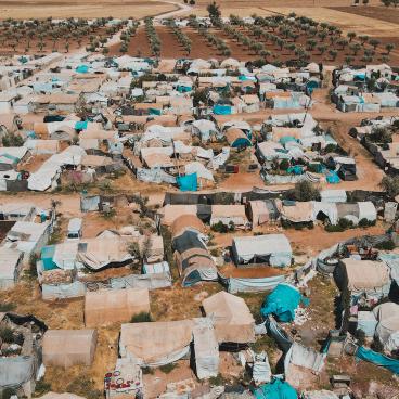 Aerial view of hundreds of tents inhabited by Syrian refugees for years due to the war that destroyed their homes.