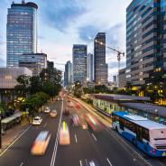 Different forms of transportation on a busy street