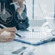 Person looking at graphs and charts